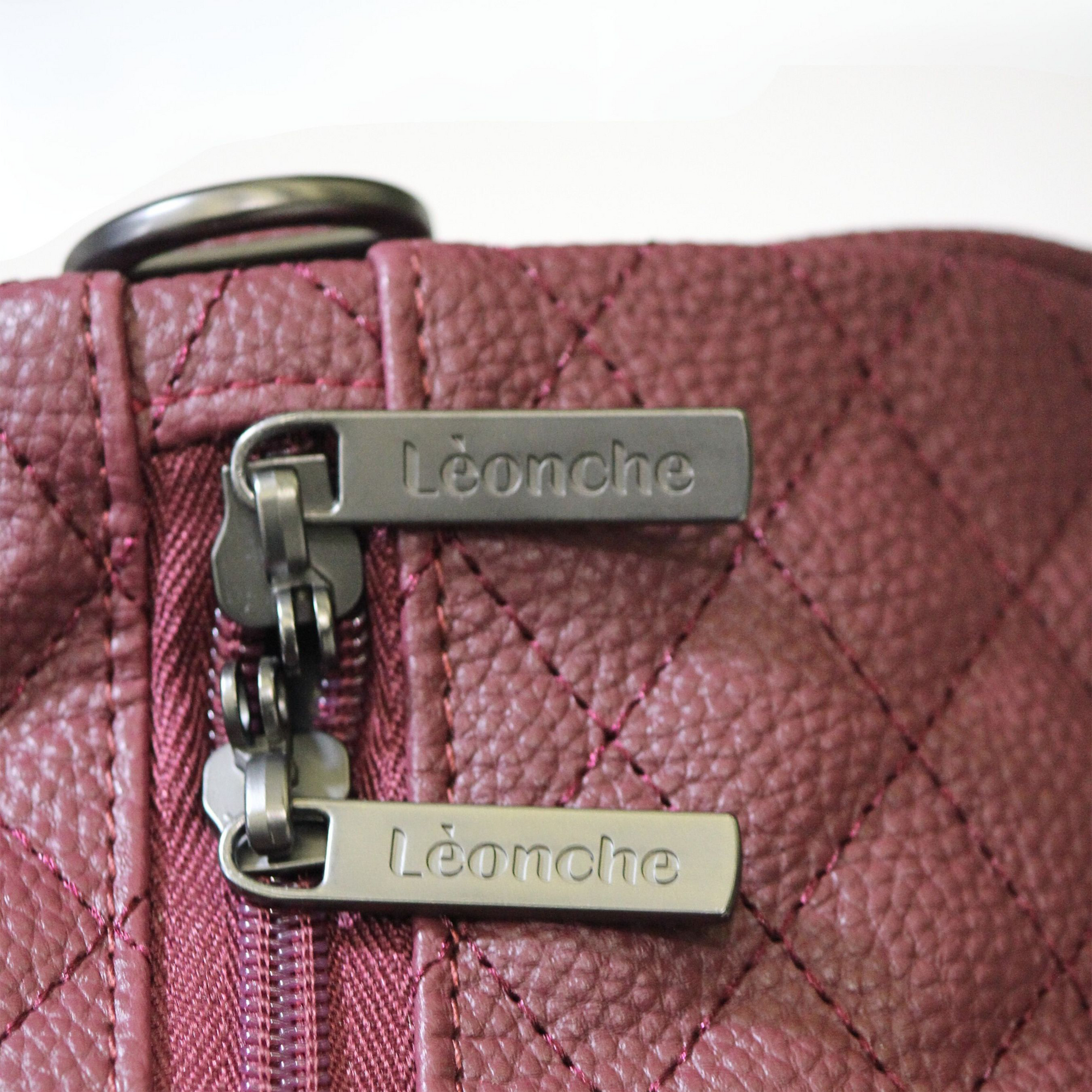 حقيبة دافل جلد عنابي - Sumer